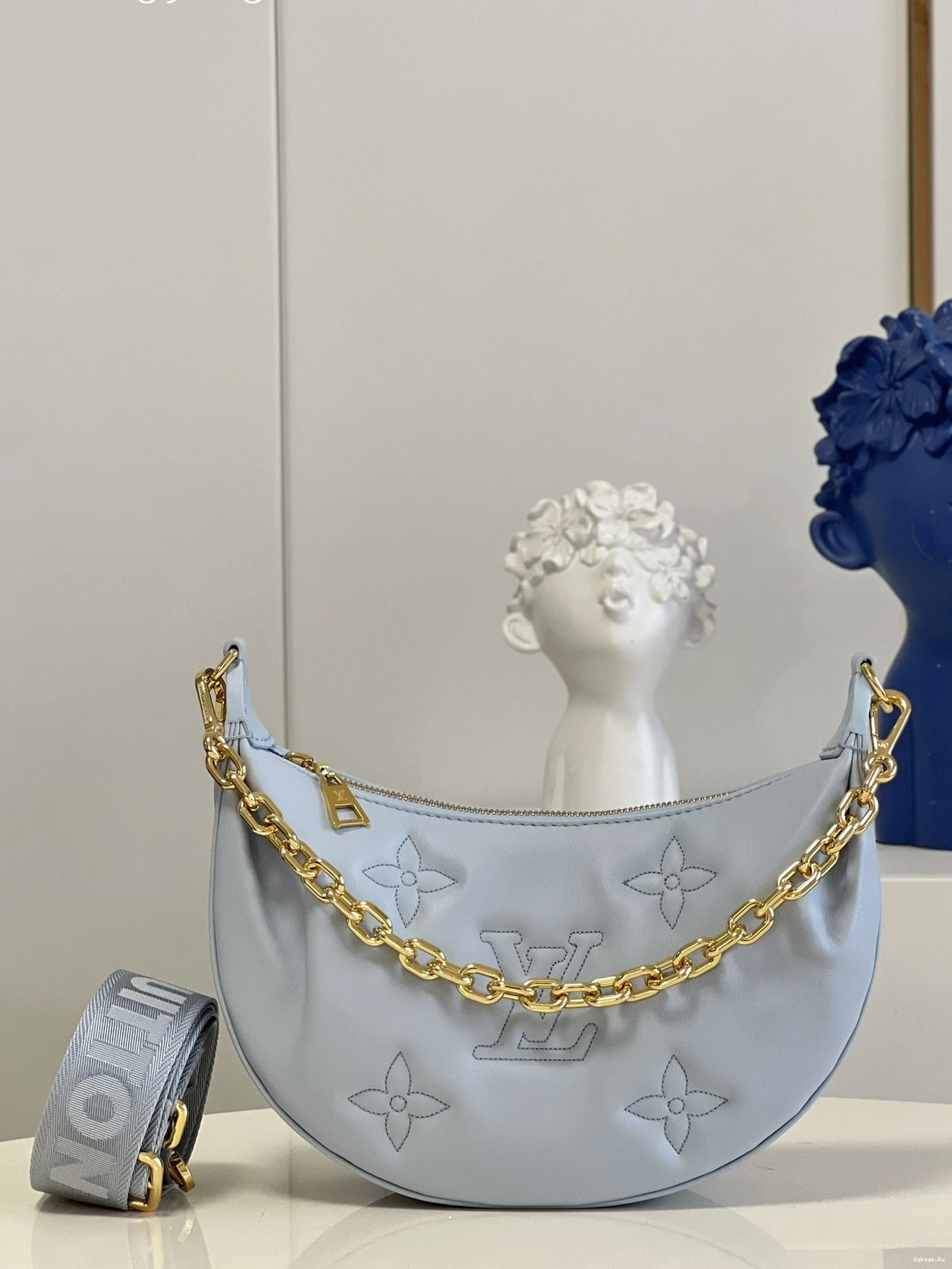 THE LOUIS OVER VUITTON MOON 0210